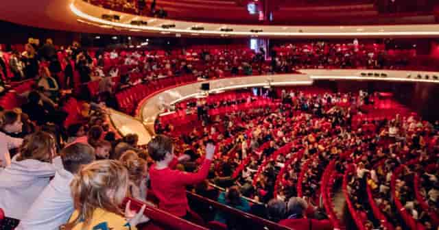 Ballet studio at Dutch National Opera, packed auditorium, event management, audience engagement.