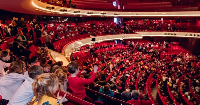Ballet studio at Dutch National Opera, packed auditorium, event management, audience engagement.