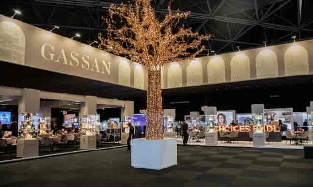 GASSAN Diamonds event with elegant lighting and networking booths for a historical tour.