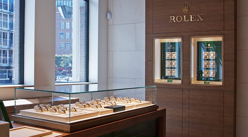 Diamond polishing tour in elegant Rolex showroom for exclusive events and product launches.