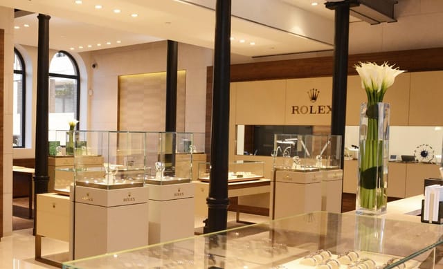 Diamond Polishing Experience at Gassan Diamonds, elegant Rolex showroom for corporate events.