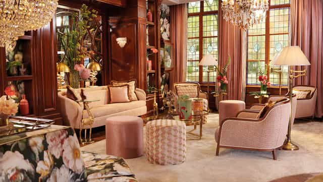 Elegant function room at Hotel Estheréa with plush seating for upscale events.