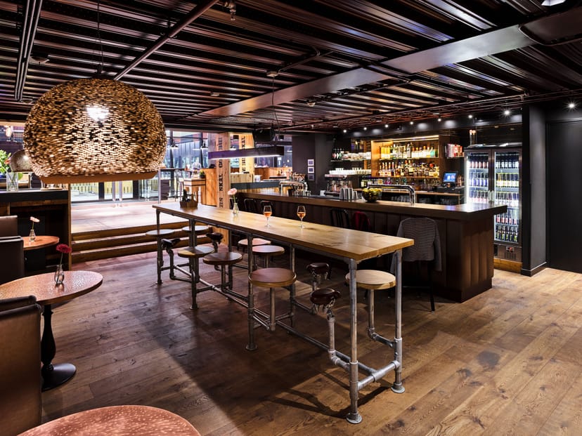 Modern bar at City Hotel, ideal for networking events and casual gatherings.