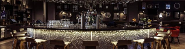 Modern bar at City Hotel, perfect for networking events and cocktail receptions.