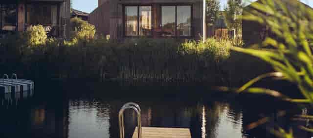 Serene waterside venue at The Vuurplaats, perfect for corporate retreats and gatherings.