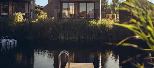 Serene waterside venue at The Vuurplaats, perfect for corporate retreats and gatherings.