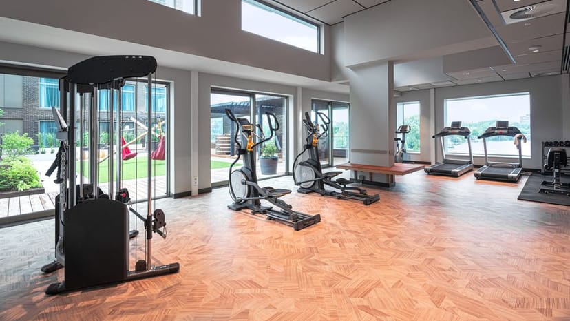 Modern fitness space in Olympic Hotel Amsterdam for wellness events and retreats.