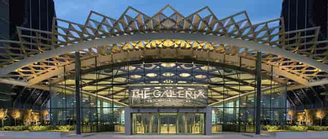 Modern event venue with glass walls, ideal for corporate functions and upscale gatherings.
