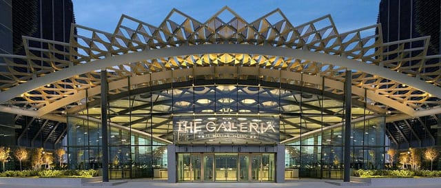 Modern event venue with glass walls, ideal for corporate functions and upscale gatherings.