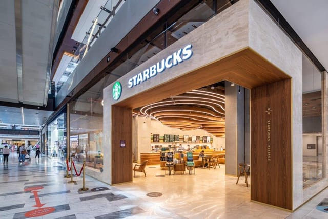 Modern Starbucks at The Galleria, ideal for networking and informal meetings.