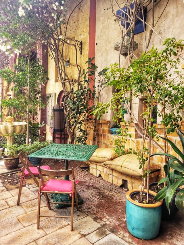 Charming outdoor seating at East West Atelier, ideal for gatherings and events.
