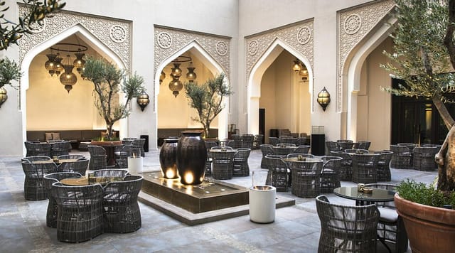 Elegant Courtyard Garden with central fountain, perfect for receptions and outdoor events.
