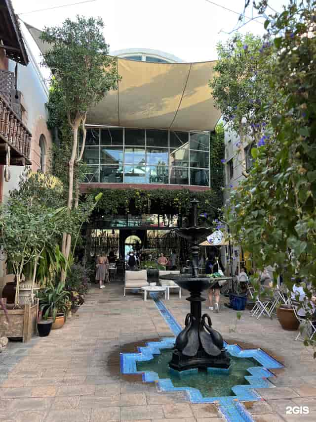 Courtyard Garden with lush greenery, ideal for receptions and networking events.