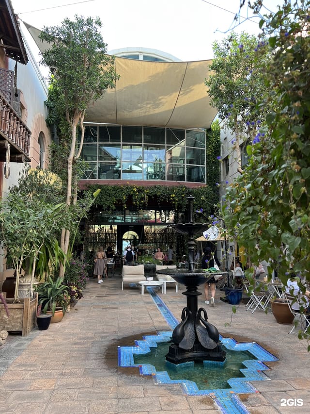 Courtyard Garden with lush greenery, ideal for receptions and networking events.
