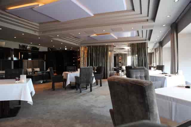 Ciel Bleu Restaurant: elegant venue with modern decor for upscale events and meetings.