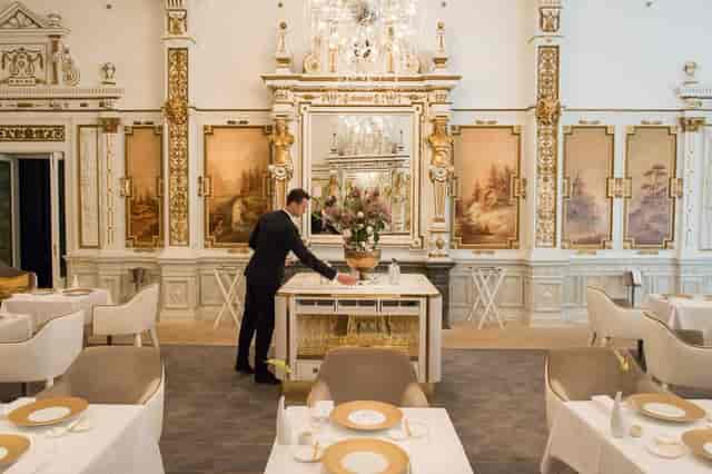 Elegant dining space in The White Room, ideal for upscale weddings and events.