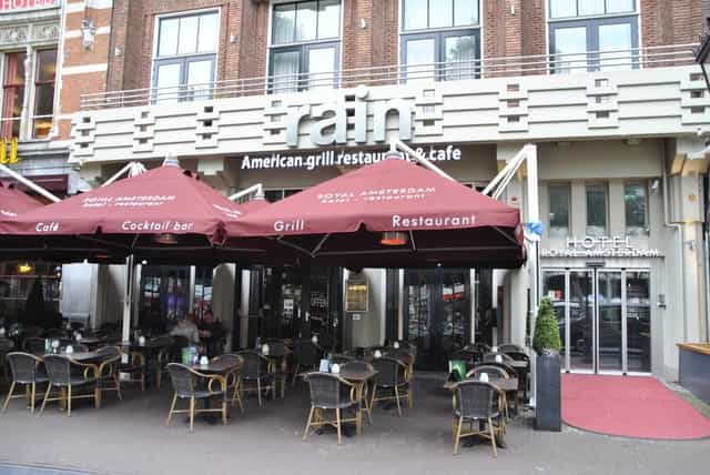 Vibrant outdoor dining at Rain restaurant, perfect for events and casual gatherings.