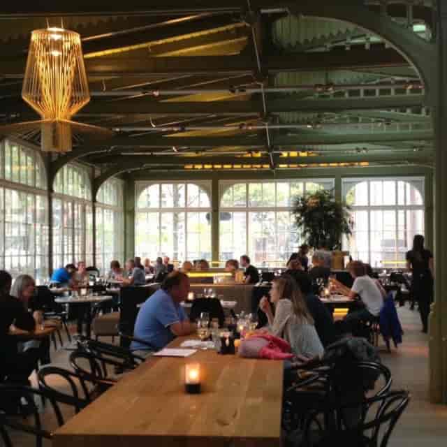 Vibrant Café-Restaurant de Plantage venue for intimate gatherings and networking events.