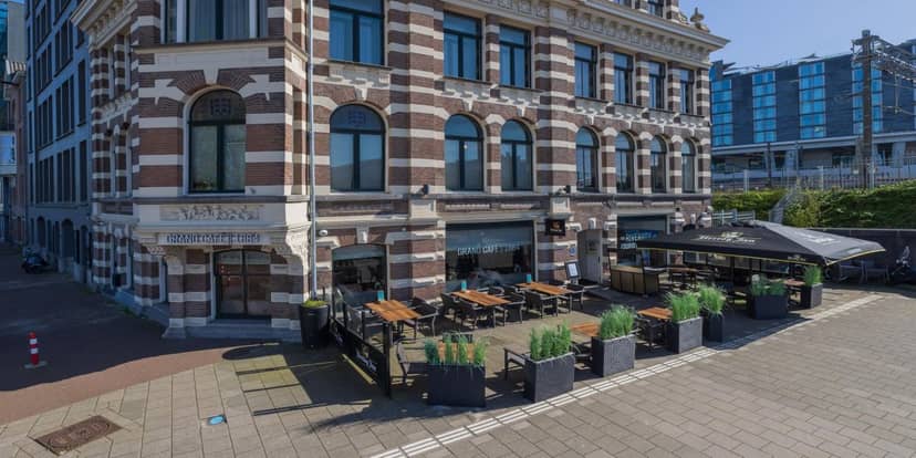 Outdoor dining at stylish Grand Café 1884, perfect for social events and gatherings.