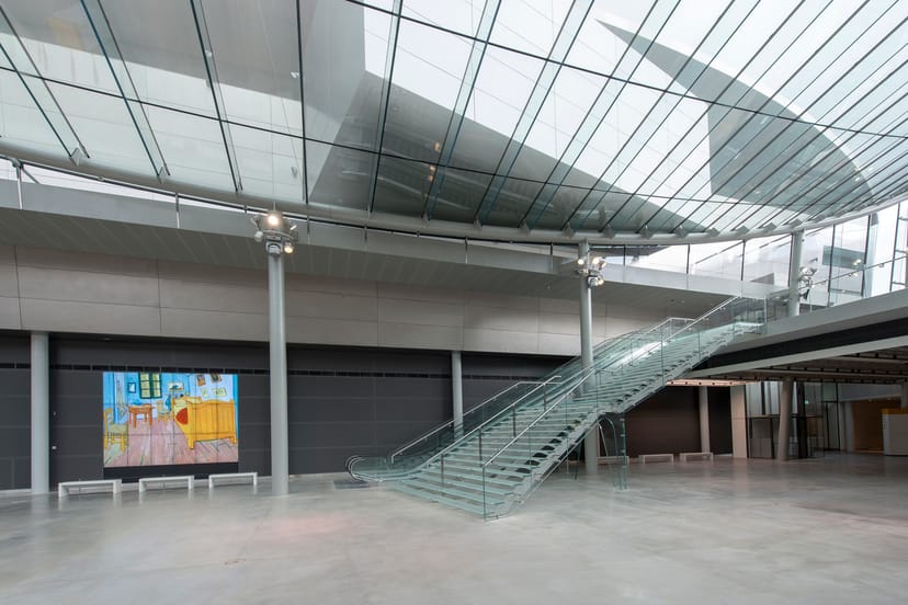 Modern Entrance Hall of Van Gogh Museum with high ceilings, perfect for events and meetings.
