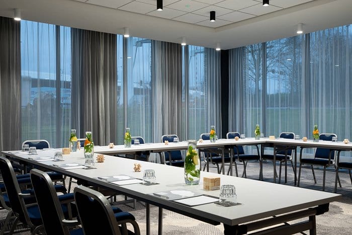 Renaissance Amsterdam Hotel U-shaped meeting room with natural light for workshops