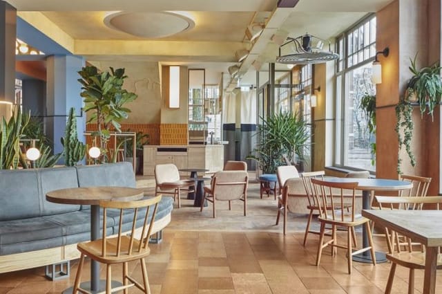 Modern event space at Small Bar, Karavaan Amsterdam, perfect for networking and meetings.