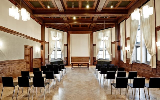 Council Room at KIT with wooden accents, ideal for corporate meetings and events.