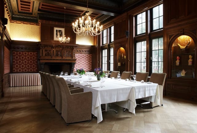 Elegant KIT Council Room with rich wood paneling, ideal for corporate meetings and events.