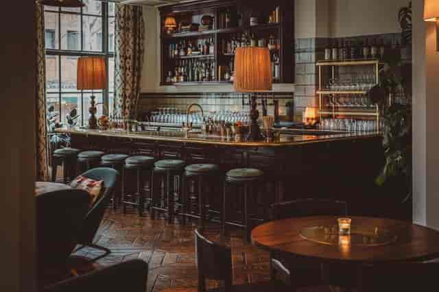 Stylish bar at The Allis Rooms, Soho House Amsterdam, perfect for events and gatherings.