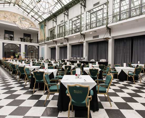 Elegant Wintergarden venue at Anantara Grand Hotel for conferences and formal events.