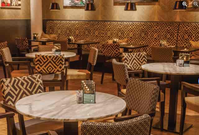 Private Hire Space at Eat Drink Meet with elegant dining and warm lighting for events.