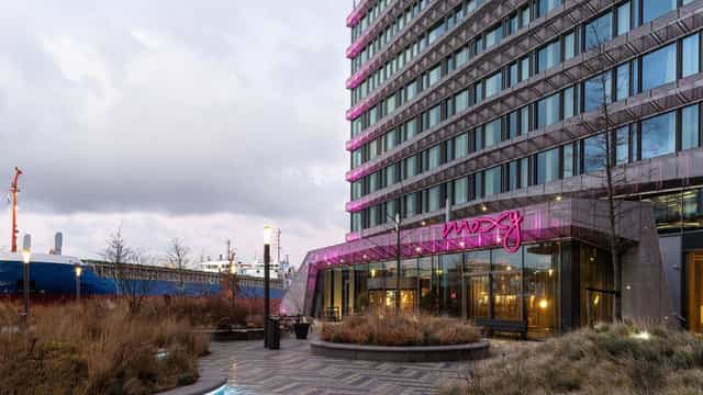 Modern hotel entrance at Moxy Amsterdam, perfect for meetings and events.