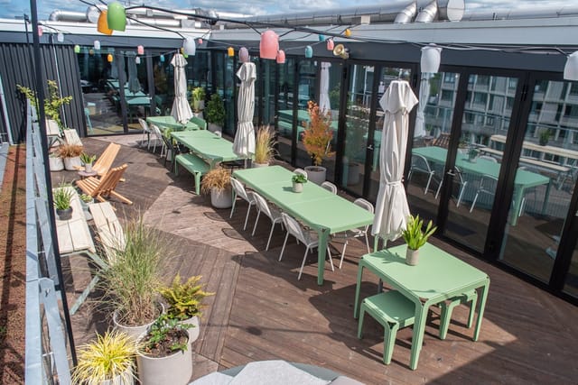 Stylish rooftop terrace in Zoku Amsterdam, perfect for summer events and networking.