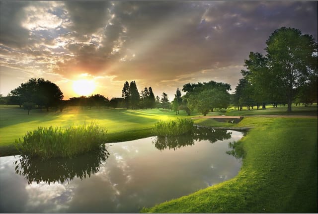 Serene Bryanston golf course at sunrise, ideal for outdoor events and corporate retreats.