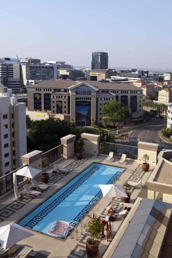 Stylish rooftop pool at Michelangelo Hotel, perfect for outdoor corporate events and networking.