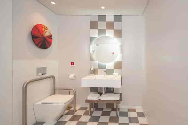 Modern restroom at Hampton by Hilton Sandton, ideal for events and meetings.