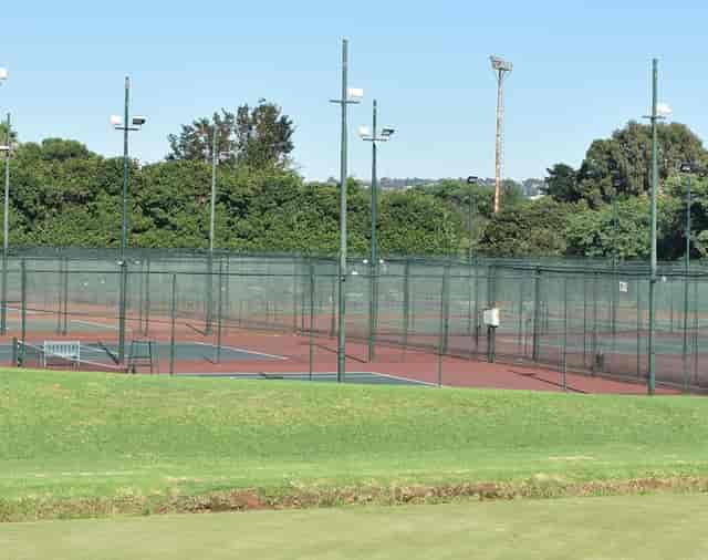Tennis court at Sportsman’s Bar, ideal for team-building and wellness retreats.