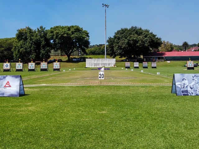 Outdoor archery event at Marks Park Sports Club with targets and spacious green field.