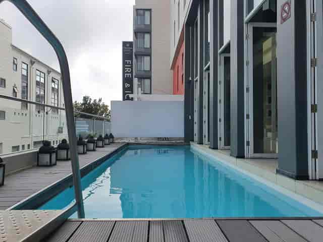 Stylish rooftop pool at Protea Hotel, ideal for networking events and cocktail receptions.