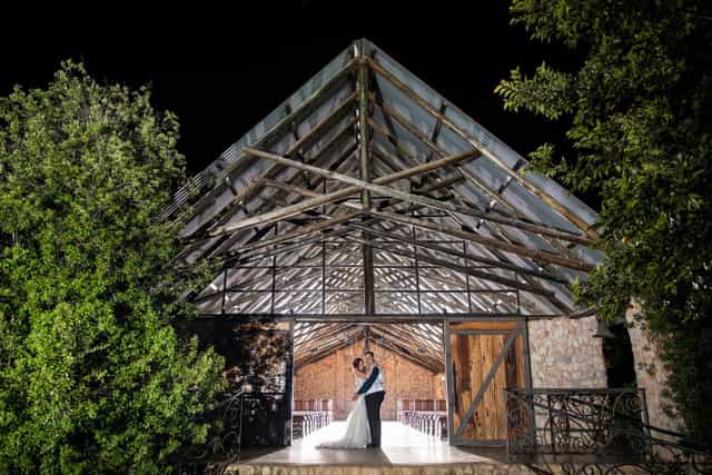 Stunning event space with glass roof, ideal for weddings and corporate events.