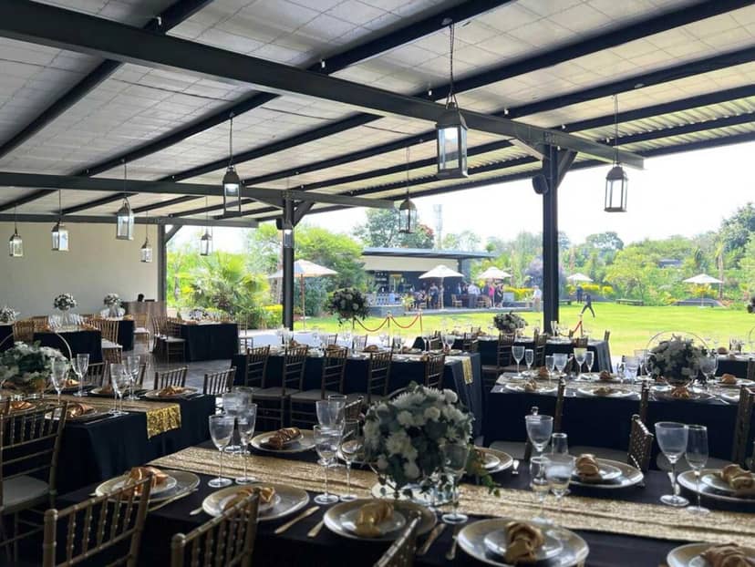 Elegant banquet space with floral centerpieces, ideal for weddings and corporate events.