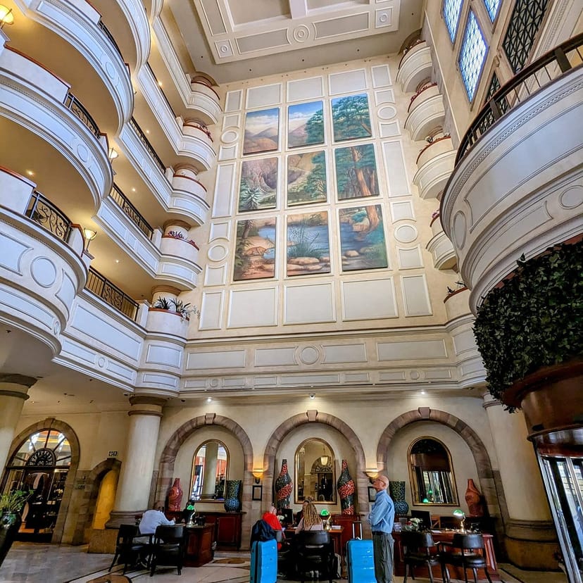 Elegant Sheraton Pretoria Hotel lobby suited for meetings and events, featuring high ceilings.