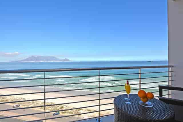 Coastal balcony view at Blaauwberg Beach Hotel, ideal for networking events and retreats.