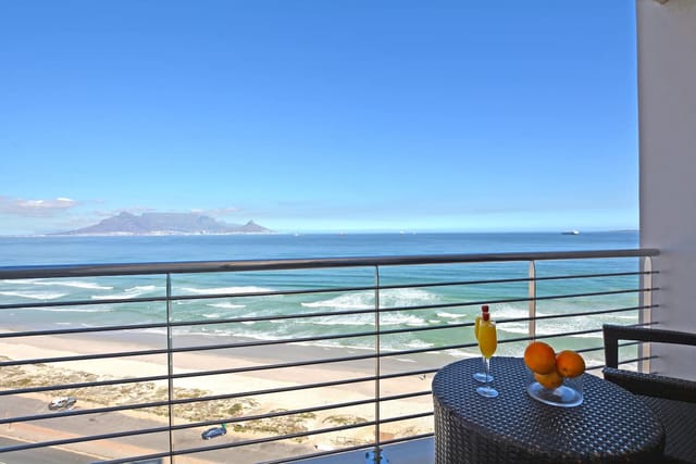 Coastal balcony view at Blaauwberg Beach Hotel, ideal for networking events and retreats.