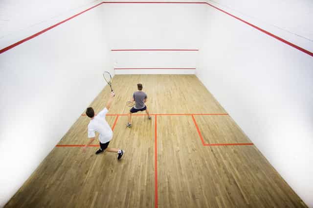 Squash players in the Palmyra Room, Kelvin Grove Club - corporate wellness event setting.