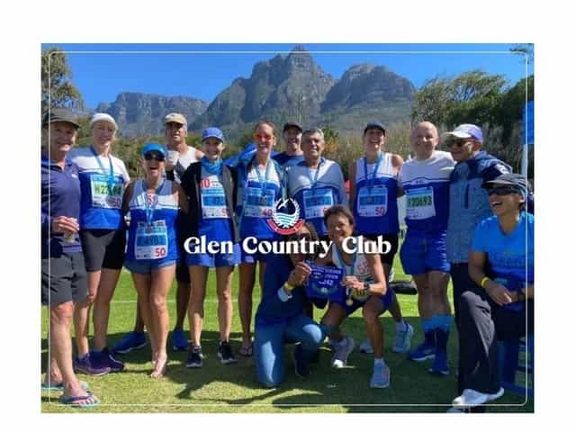 Participants celebrate in a scenic outdoor venue at The Glen Club post-event.