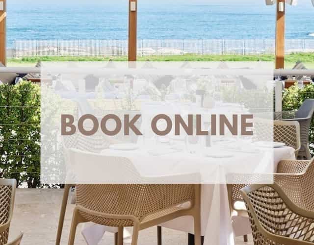 Elegant dining area at Clubhouse, The Glen Club, perfect for events by the waterfront.