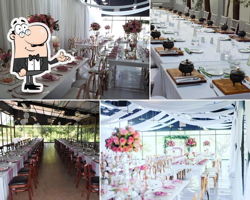 Elegant dining setup with floral centerpieces at Riverside Venue for weddings and events.