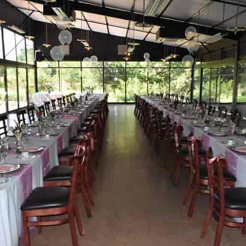 Elegant banquet hall with purple linens, perfect for team building corporate events.