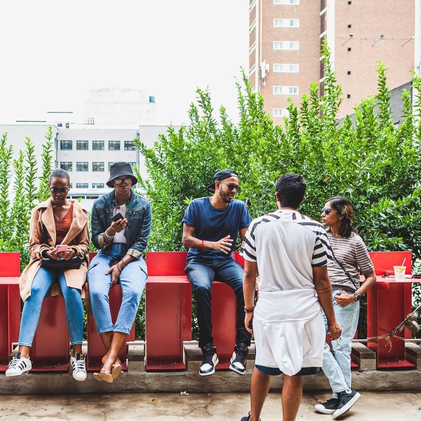 Rooftop Deck in Play Braamfontein, casual meeting space with greenery for networking.